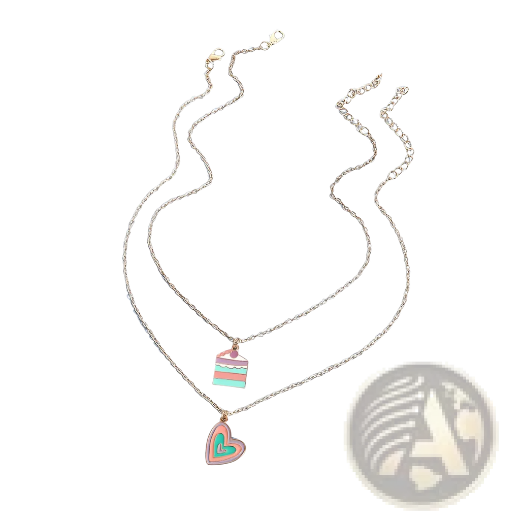 Delicate gold-toned chain necklaces with layered design and pastel pink and mint green enamel cake and heart charms