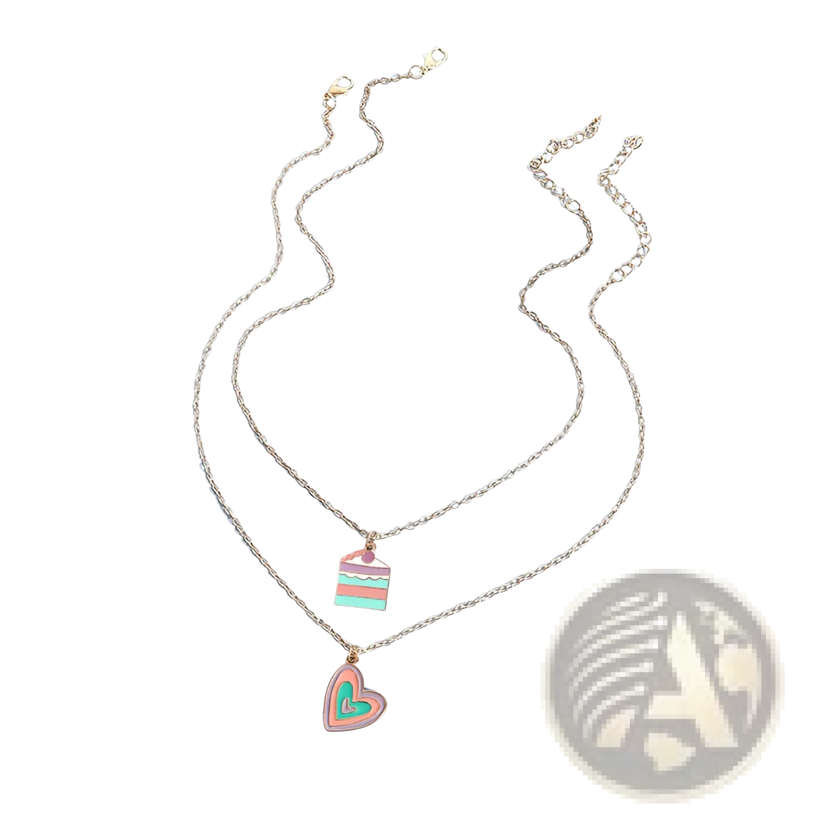 Delicate gold-toned chain necklaces with layered design and pastel pink and mint green enamel cake and heart charms