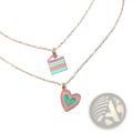 Delicate gold-toned chain necklace with pastel enamel layered cake and pink teal double-layered heart charms