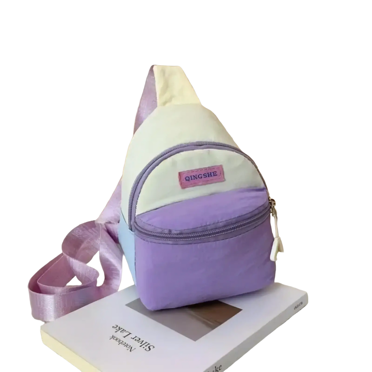 Pastel kids crossbody bag by Qingshe in pastel purple and cream with satin strap lightweight chest pack design