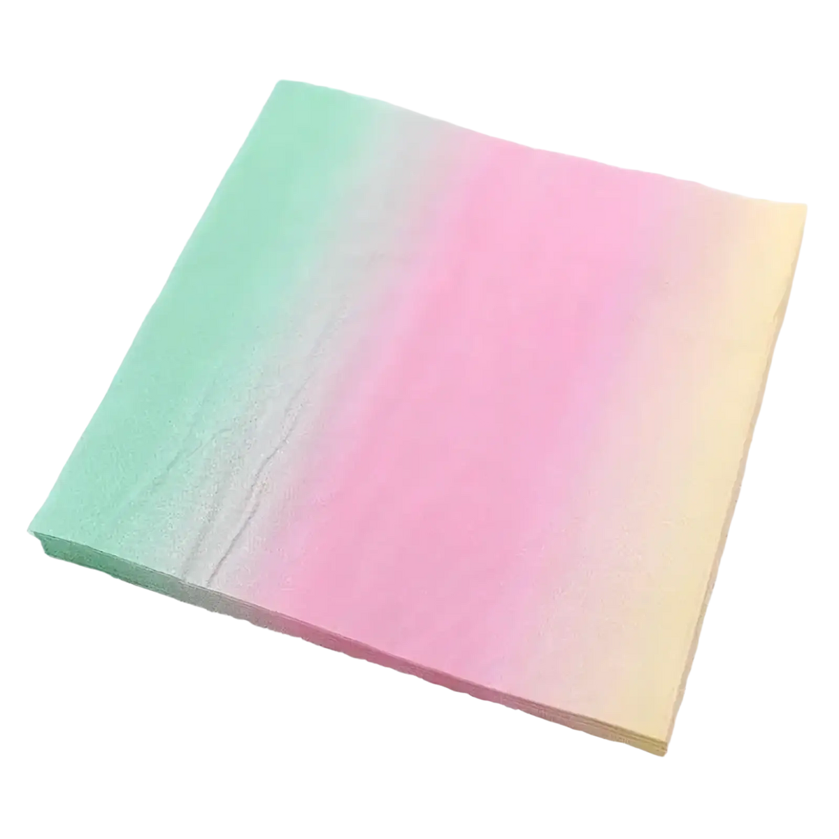 Pastel rainbow party tableware set featuring a stack of pastel gradient paper with soft green to pink to yellow marbled texture