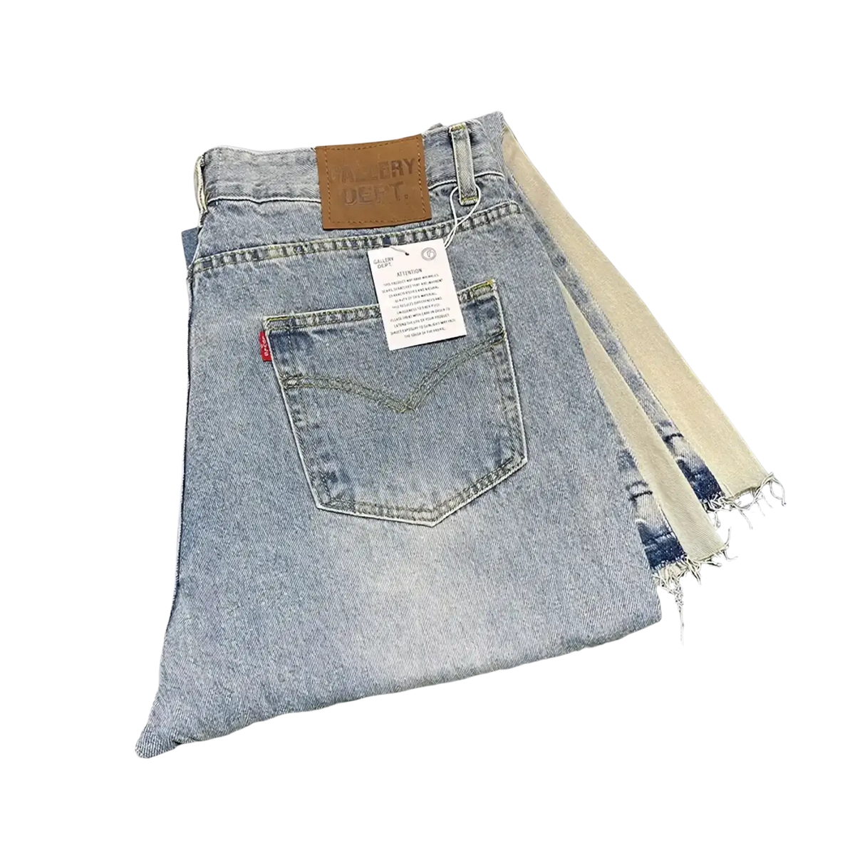 Back side of light-wash patchwork denim bell bottom jeans featuring a frayed hem and brown leather brand patch