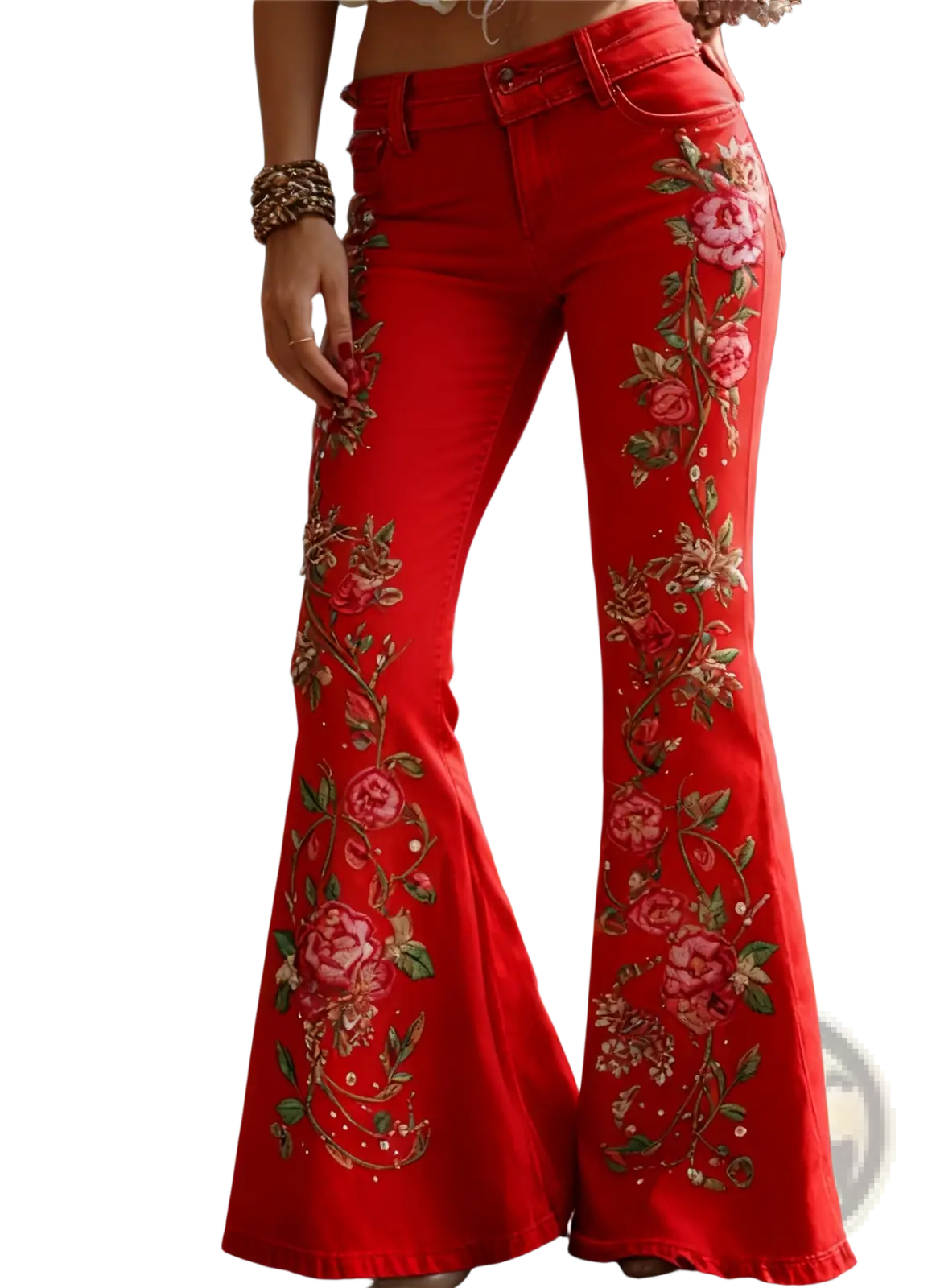 Red flared patchwork denim pants with intricate pink green and gold floral embroidery on fabric