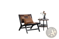 Brown leather patchwork lounge chair with black wooden frame designed as a stylish accent chair