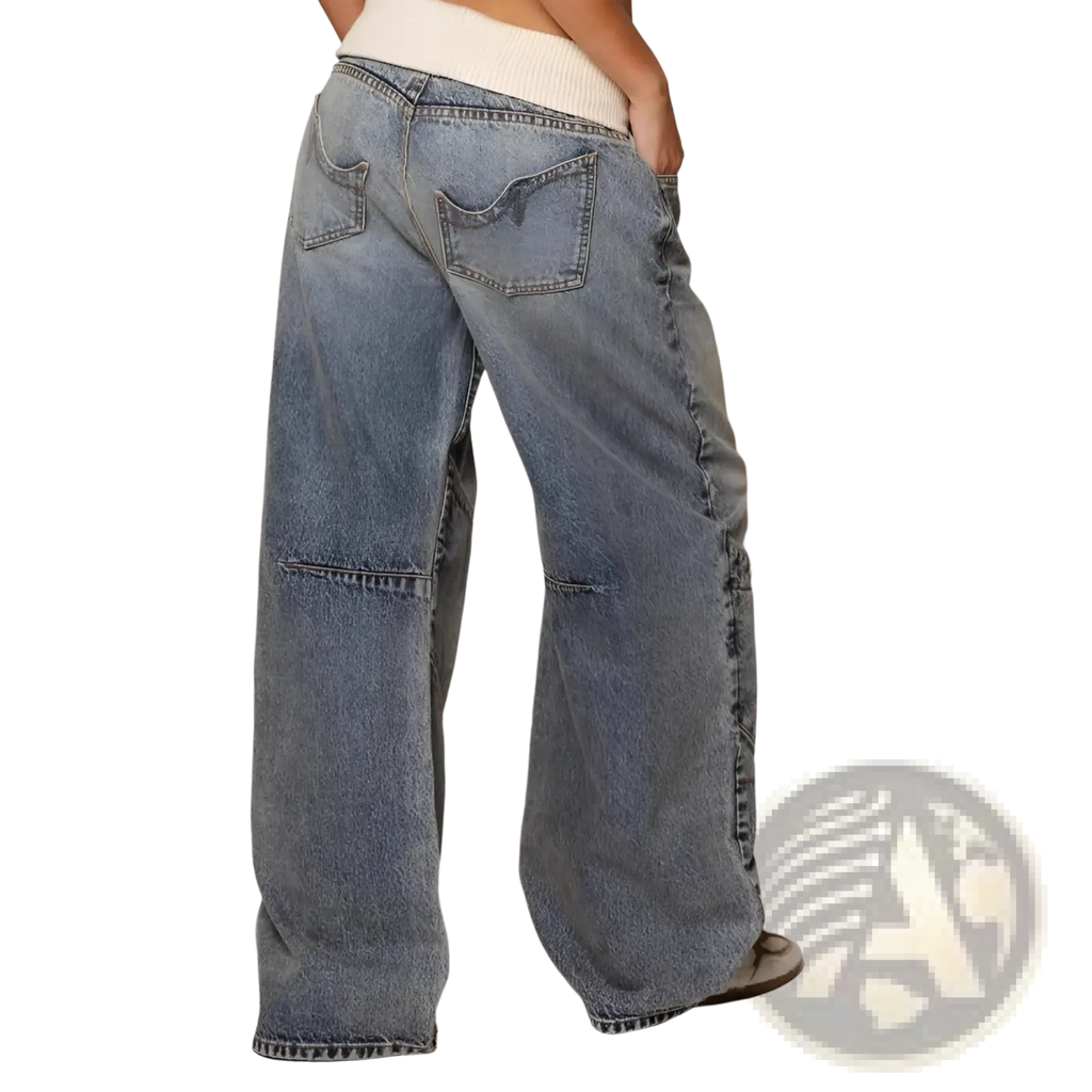Patchwork straight leg jeans for women in light blue faded denim with visible stitching and wide-leg casual design