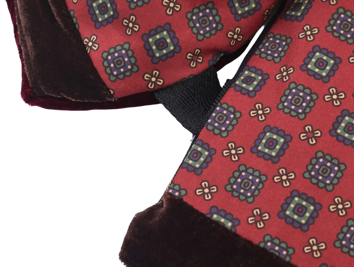 Patchwork velvet winter vest with red fabric geometric pattern in purple green beige and dark brown velvet trim