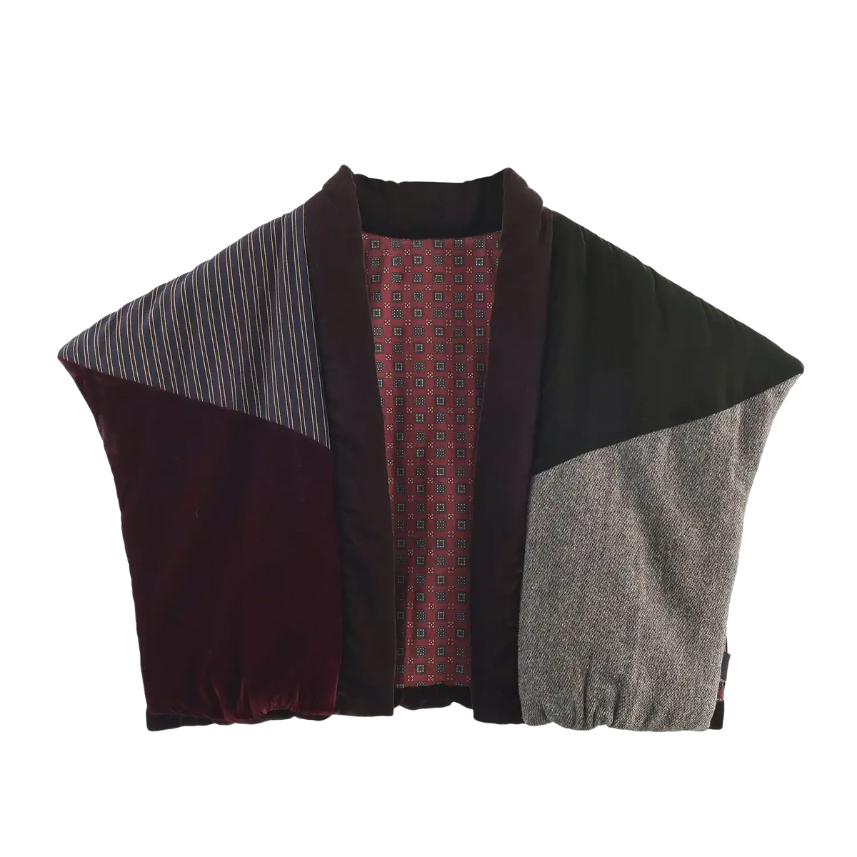 A patchwork velvet winter vest with burgundy velvet, black fabric, gray weave, and a maroon geometric panel
