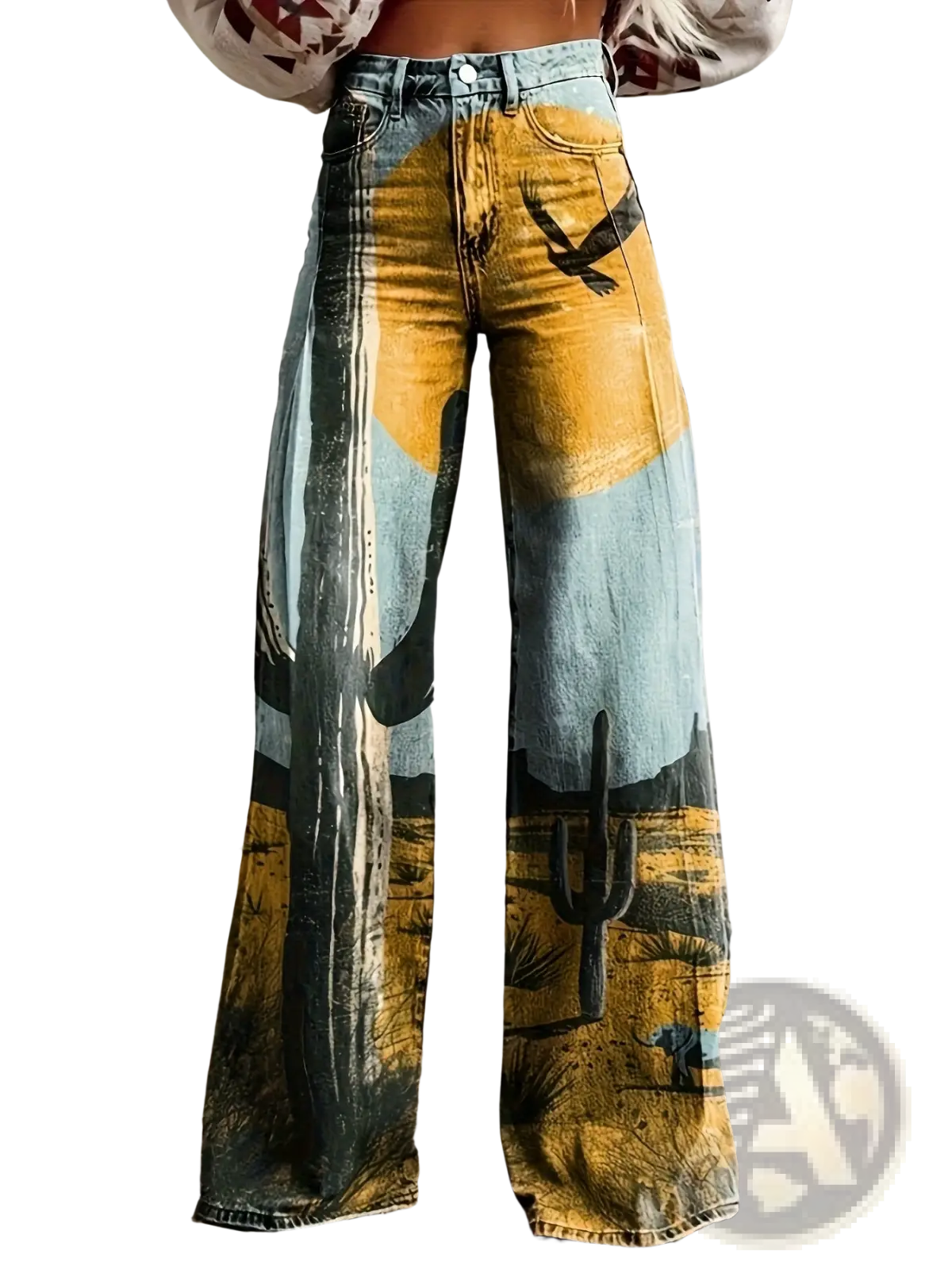 Patchwork wide leg denim pants with vibrant desert landscape print featuring cacti, eagle, warm yellow and blue tones