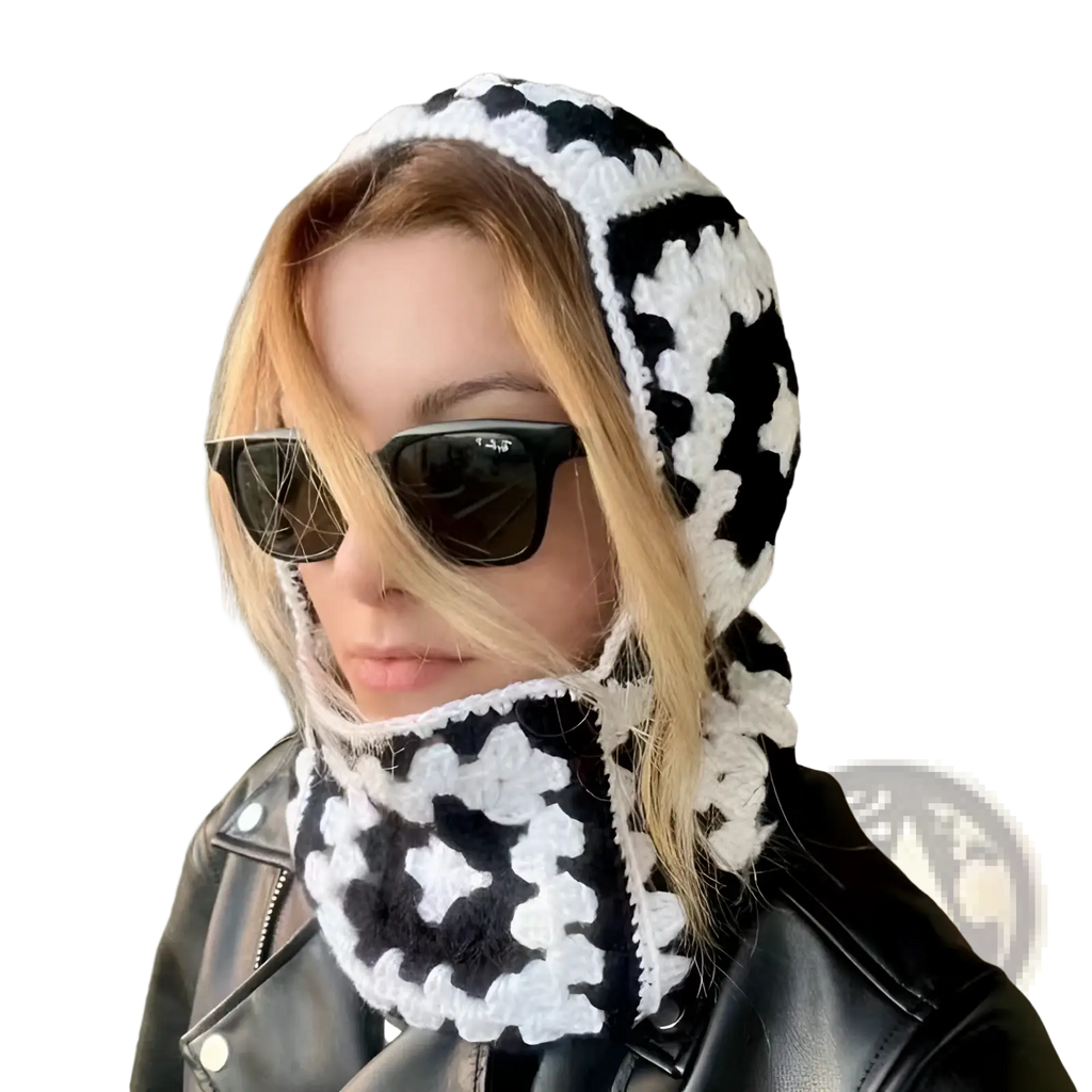 Black and white crocheted patchwork wool hooded beanie and matching scarf set for winter wear