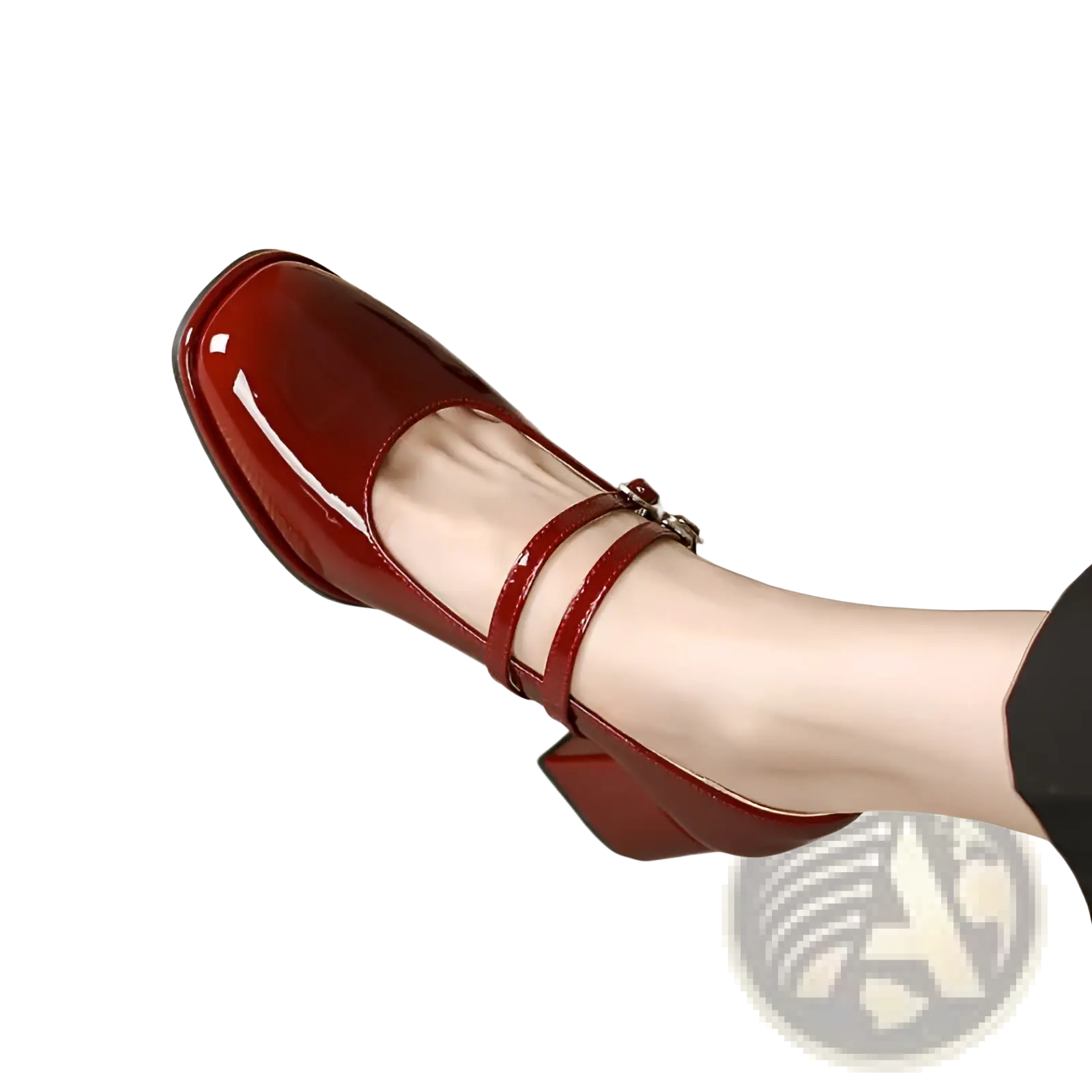 A glossy red patent leather mary jane double strap block heel shoe with a square toe and low heel