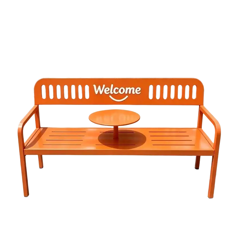Bright orange metal patio bench with built-in circular table and welcome logo for outdoor furniture use