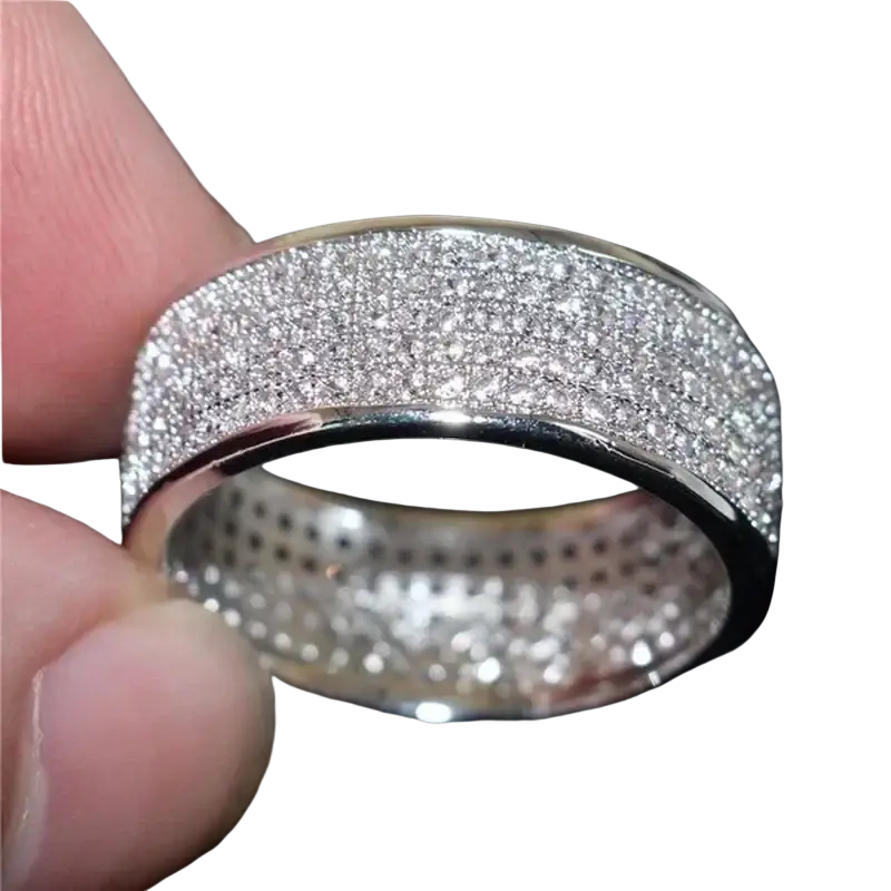 A wide silver band paved zircon wedding engagement ring with sparkling clear cubic zirconia stones in a dense pattern