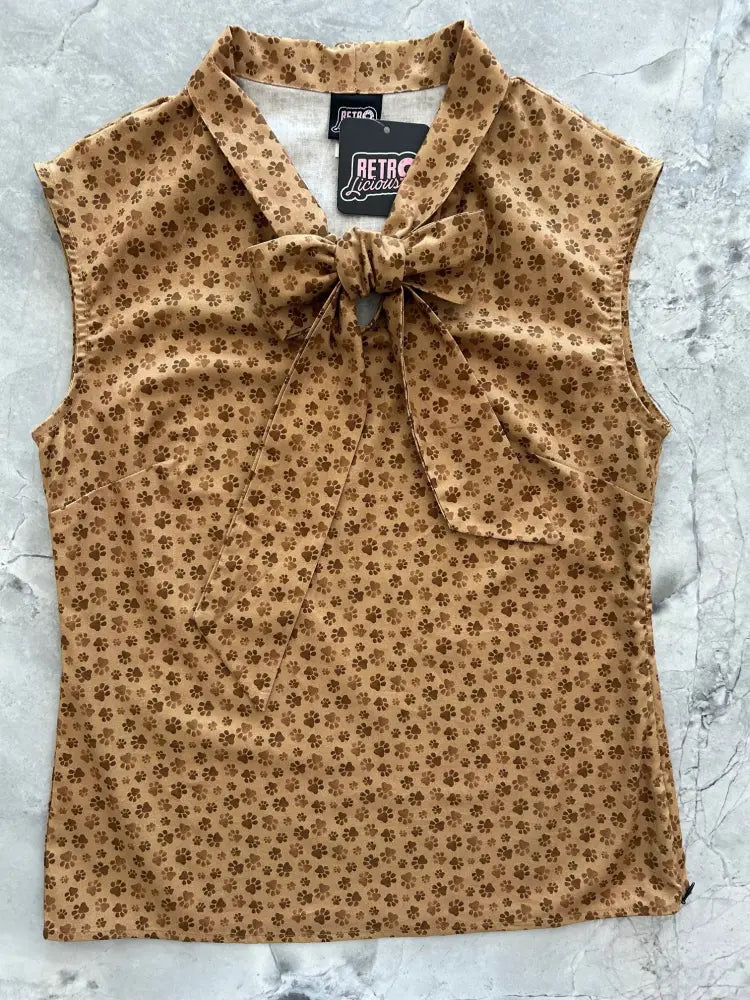Vintage paw print bow sleeveless cotton top in mustard yellow with brown floral pattern and tied collar bow