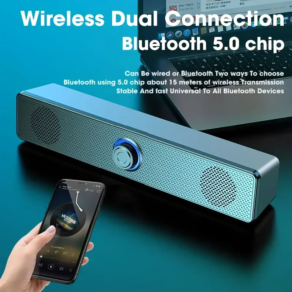 Sleek silver and black pc soundbar bluetooth wireless usb desktop speaker with blue accent ring on control knob