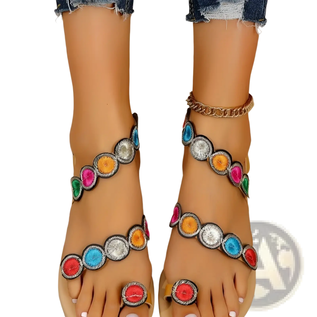Peacock embroidery flat sandals for women featuring colorful circular embellishments on tan leather straps