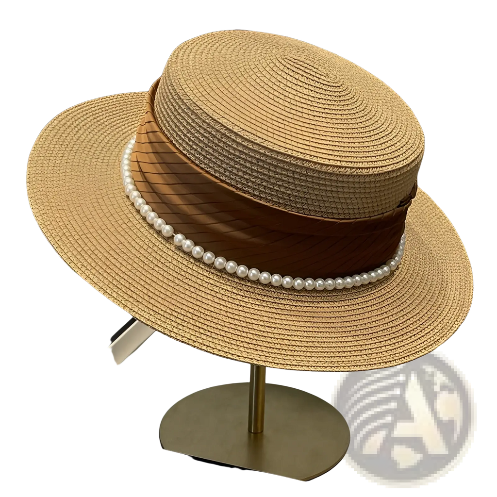 Beige straw sun hat for children with a brown satin ribbon and white pearls around the brim