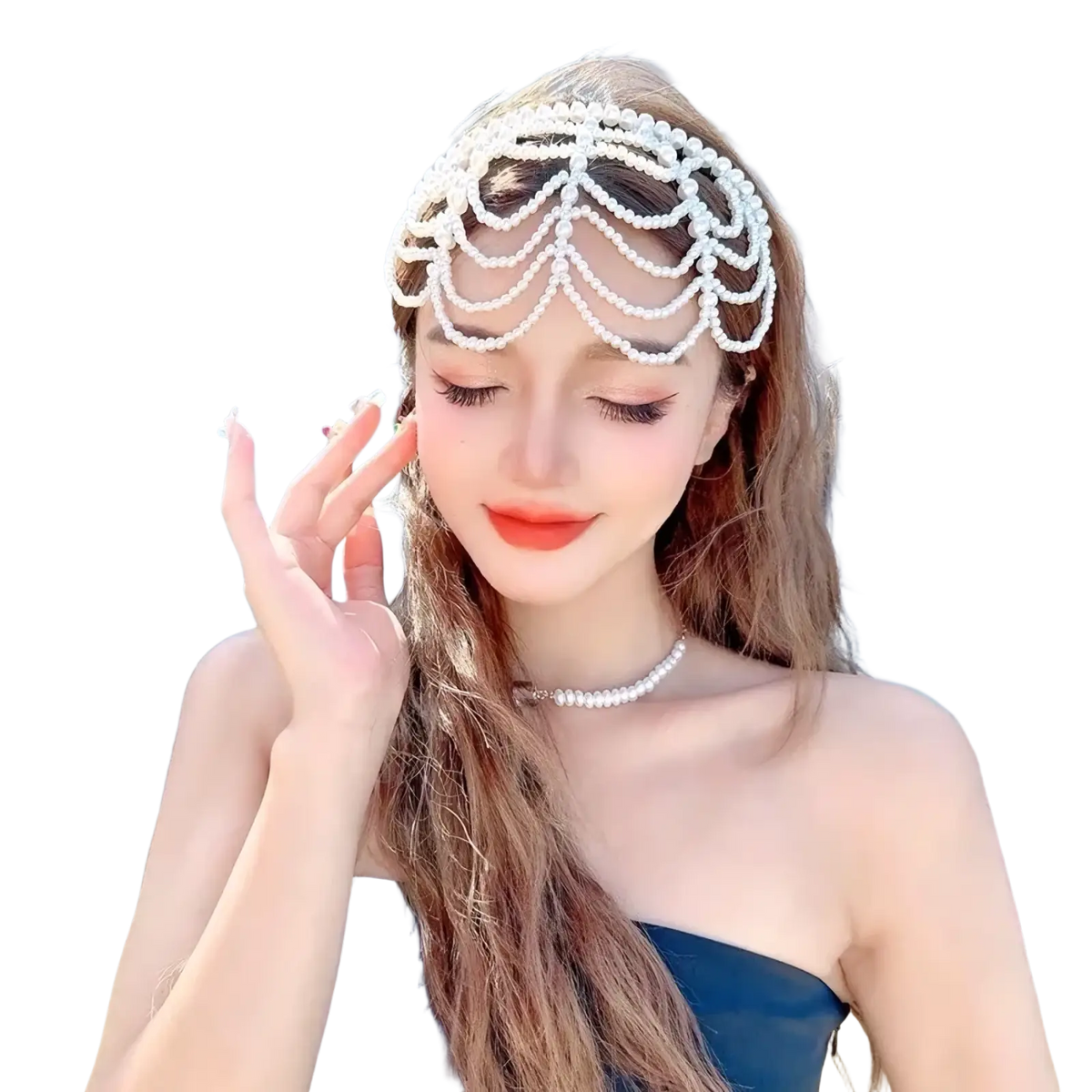 A delicate white pearl bridal crown hair band with an intricate cascading chandelier tassel design