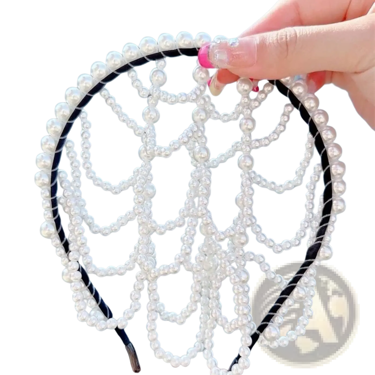 A delicate white pearl bridal crown hair band with a black braided base and intricate beaded tassel design