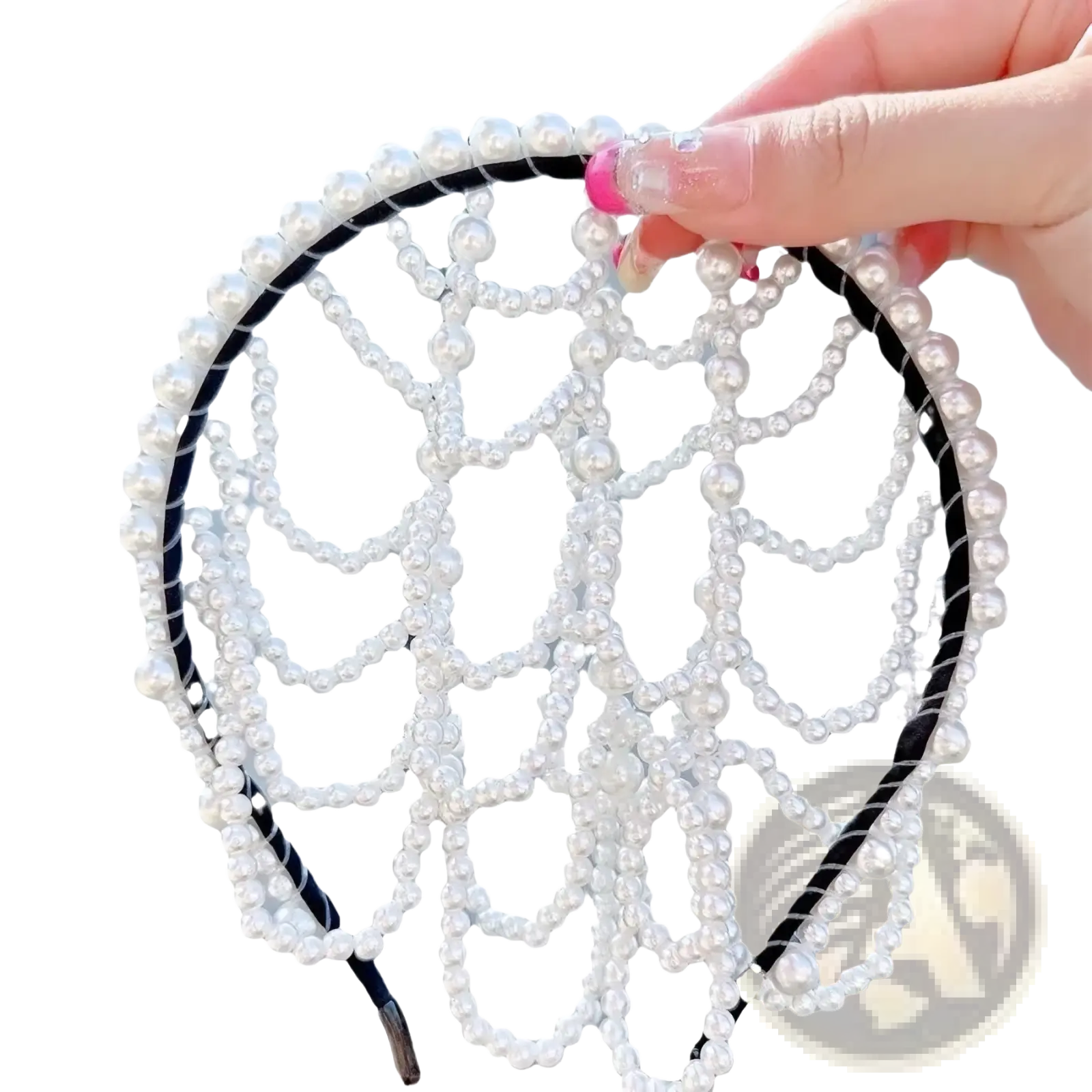 A delicate white pearl bridal crown hair band with a black elastic band and intricate beaded tassel design