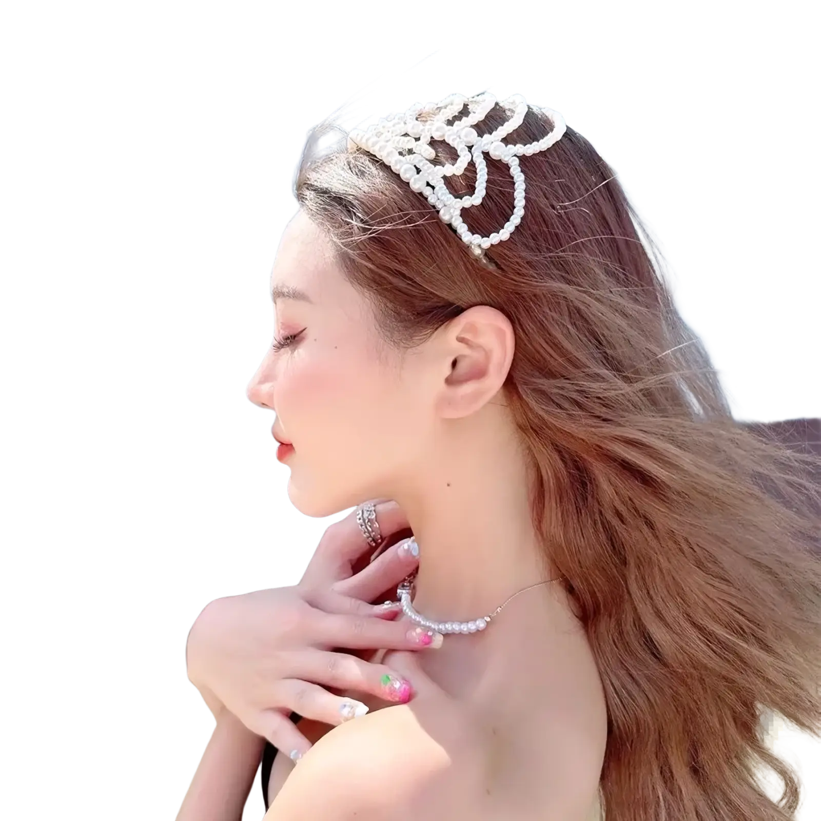 A delicate white pearl bridal crown hair band featuring an intricate floral design and elegant tassel accents