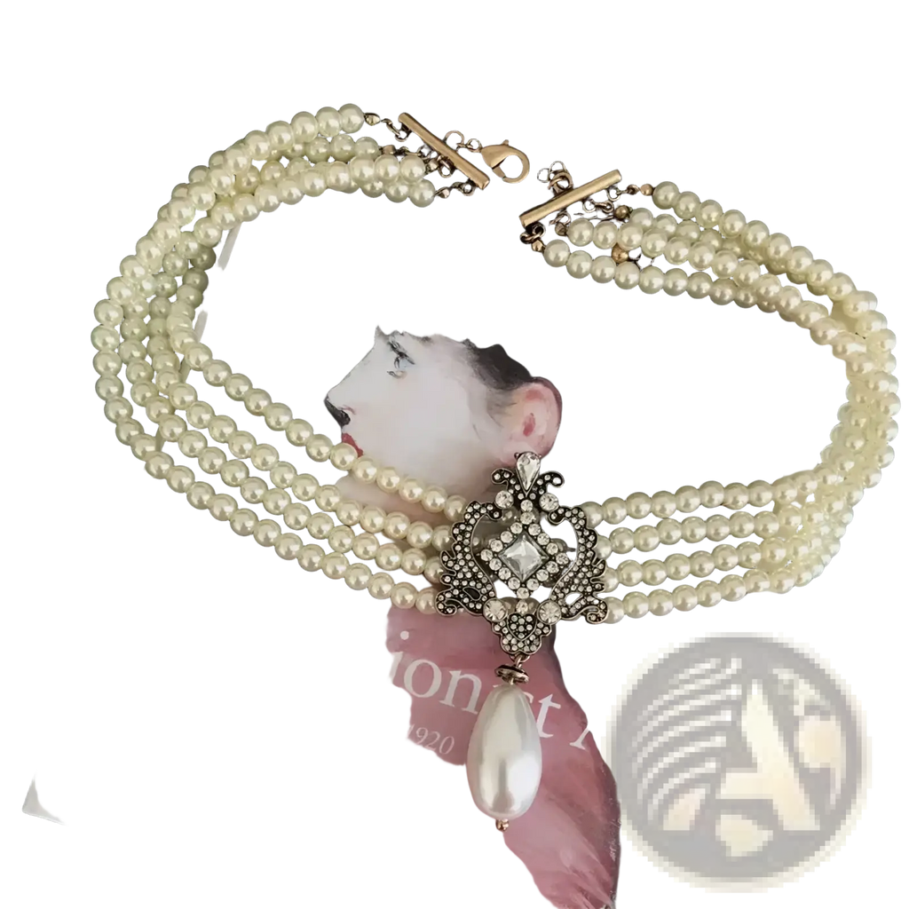 Elegant cream-colored triple-strand pearl choker necklace with silver-toned diamond-encrusted pendant and teardrop pearl drop