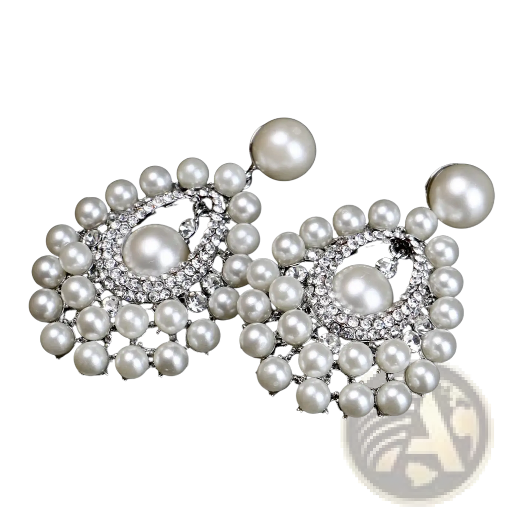 Elegant pearl drop earrings featuring crystal chandelier design with silver-toned metal frame for bridal jewelry