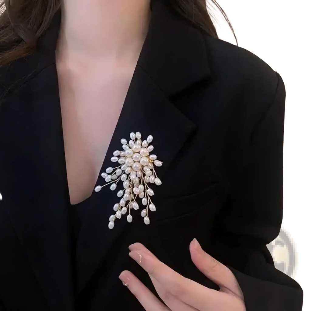 Elegant pearl flower brooch pin in white and gold tones featuring a delicate branching floral design for fashion jewelry