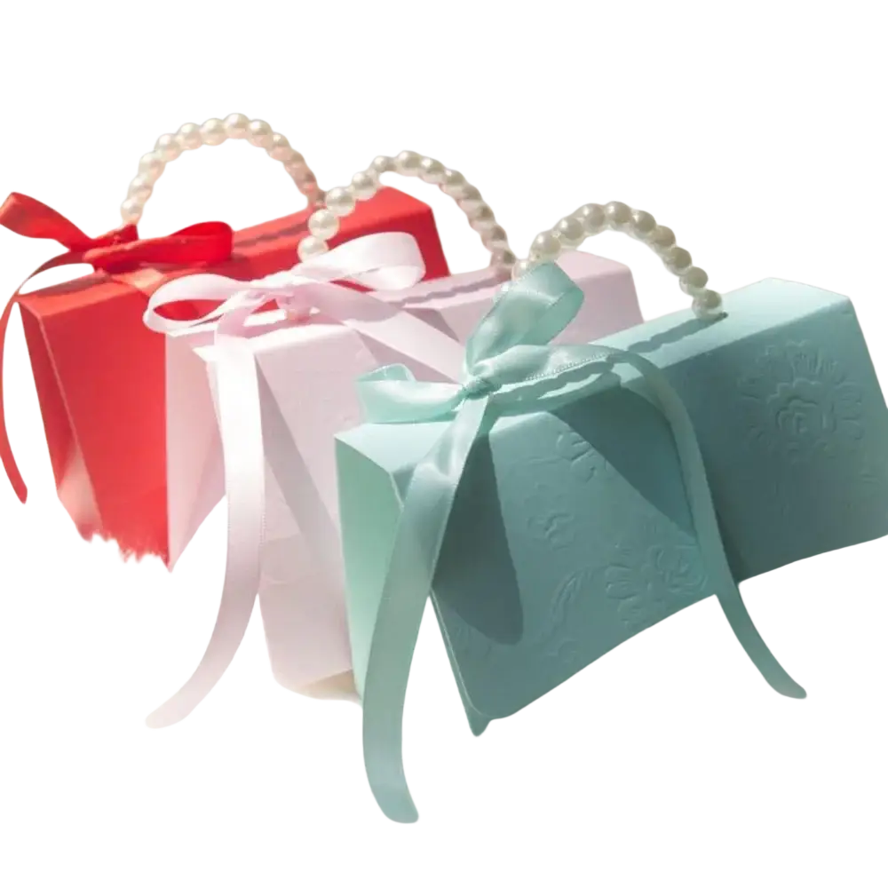 Pastel blue party favor gift box with pearl handle and satin ribbon bow for candy packaging
