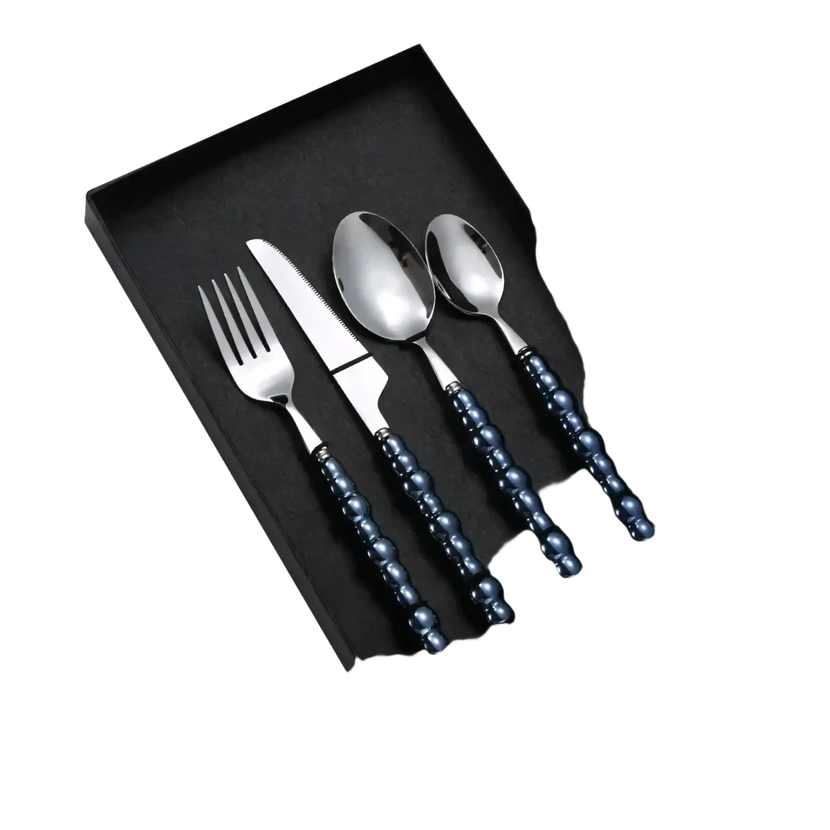 Elegant pearl handle stainless steel cutlery set with navy blue beaded handles neatly arranged in a black gift box