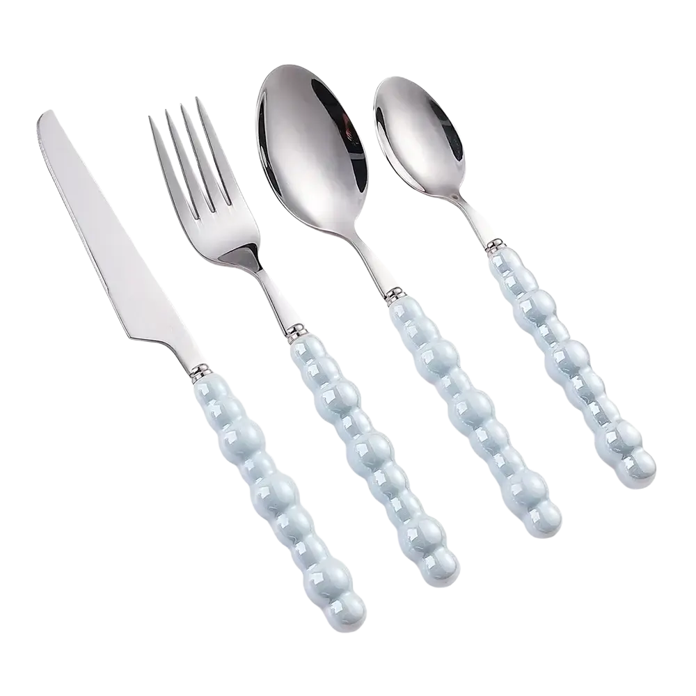Set of four stainless steel cutlery with light blue pearl beaded handles for elegant dining use