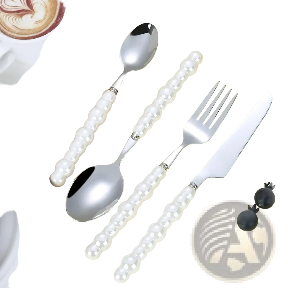 Elegant pearl handle stainless steel flatware set with spoon fork and knife on yellow surface