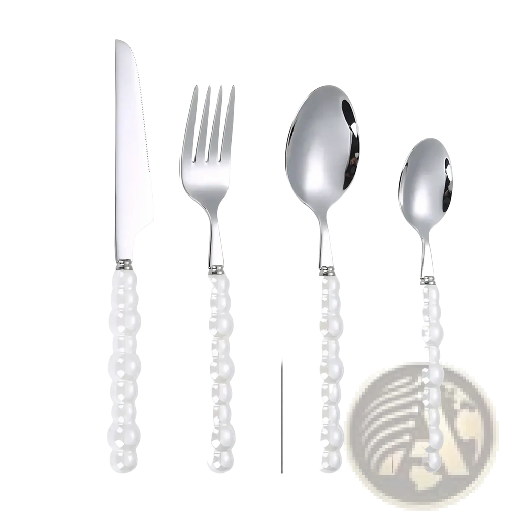 Set of four silver-toned stainless steel flatware pieces with pearl-like white beaded handles for elegant dining
