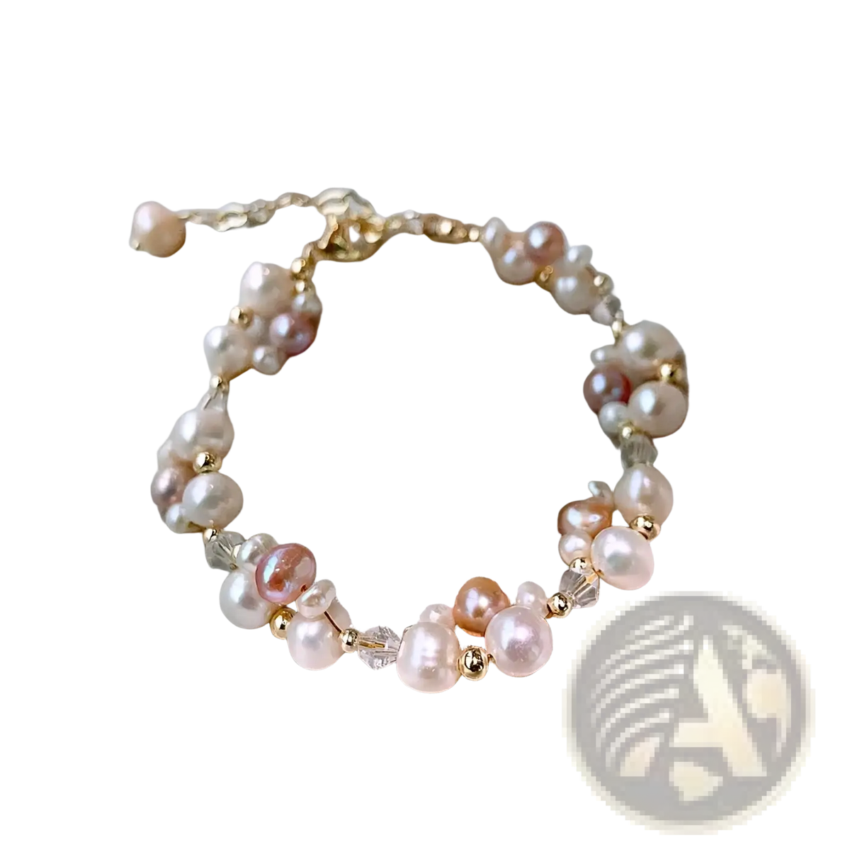 A delicate 14k gold filled bracelet with pink peach white freshwater pearls and clear crystal beads in a pearl jewelry set