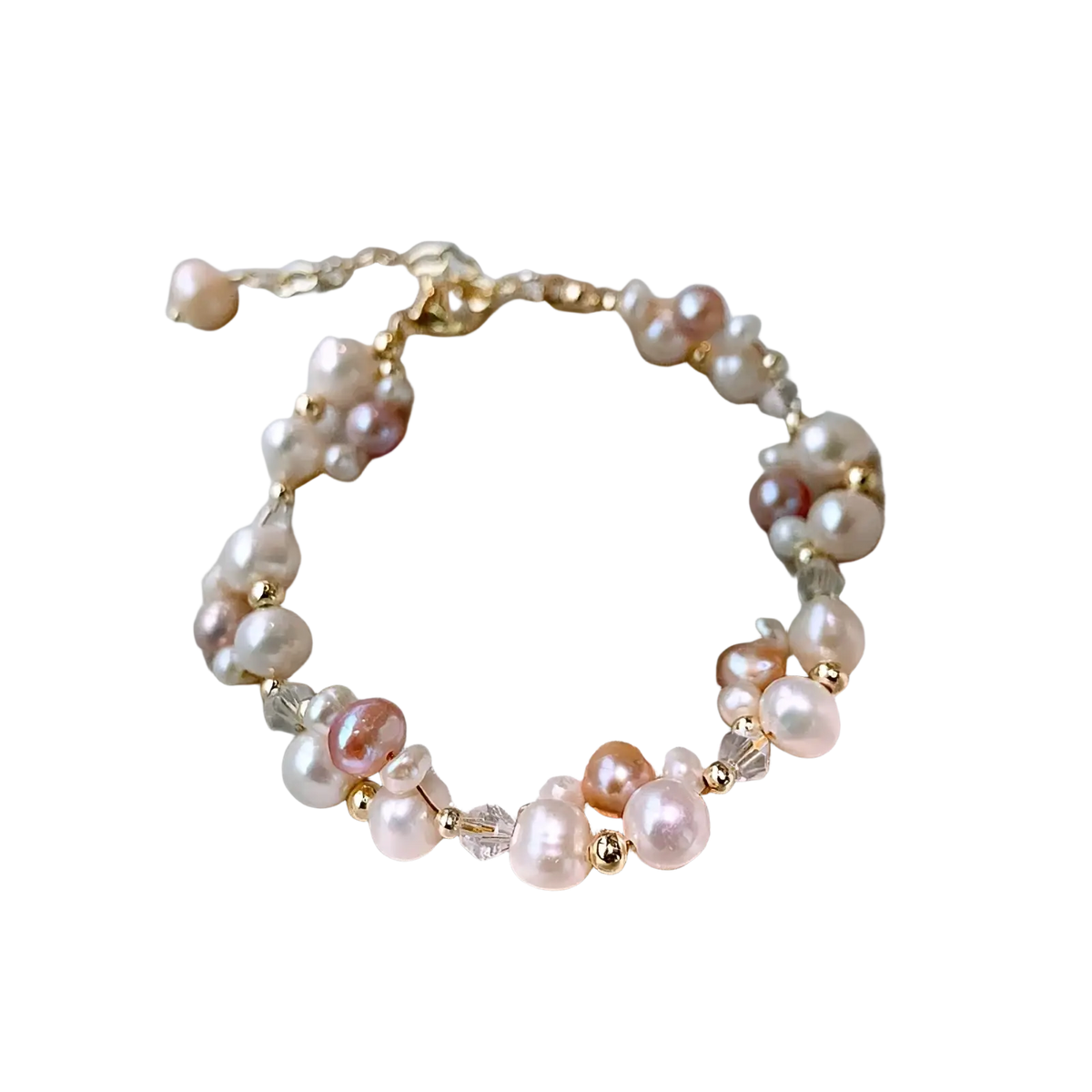 A delicate 14k gold filled bracelet with pink peach and white freshwater pearls and clear crystal beads