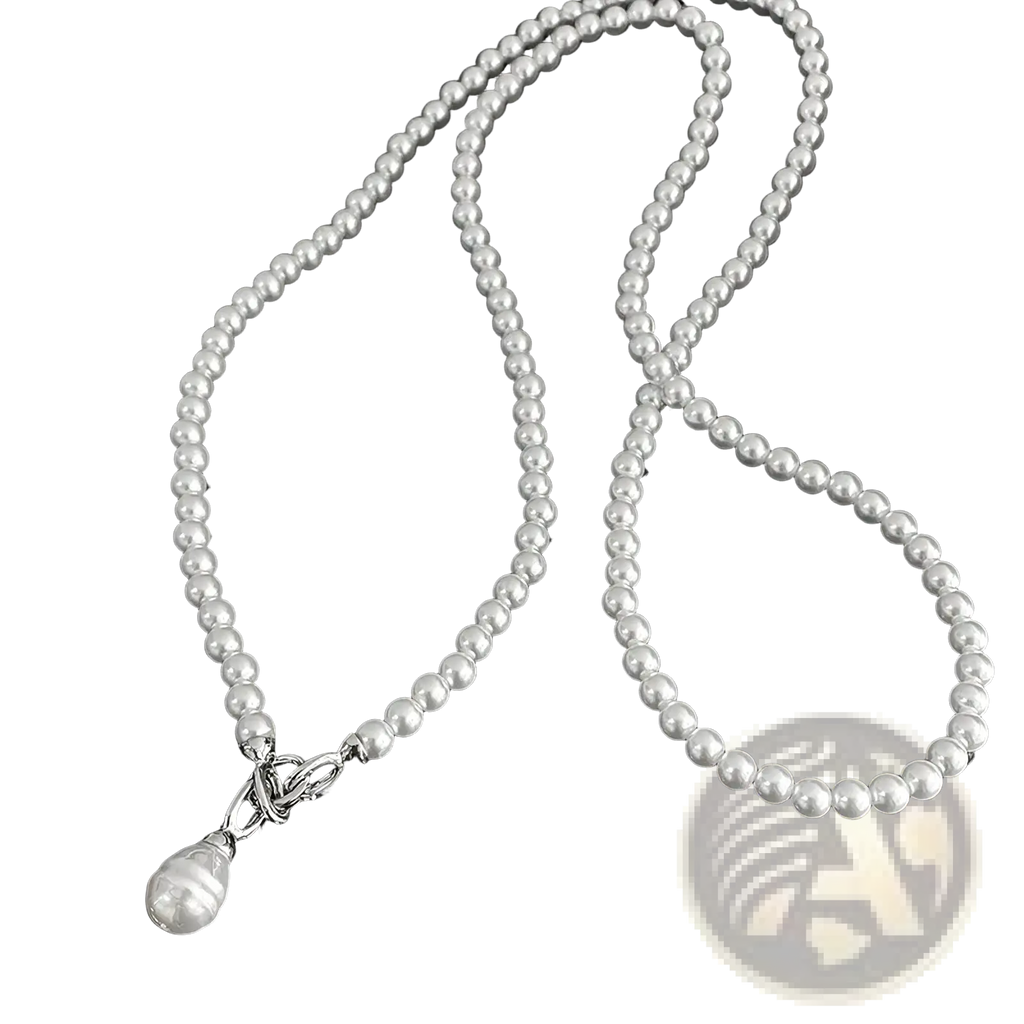 A delicate silver-toned pearl pendant long necklace with uniform white pearls and a teardrop pearl detail