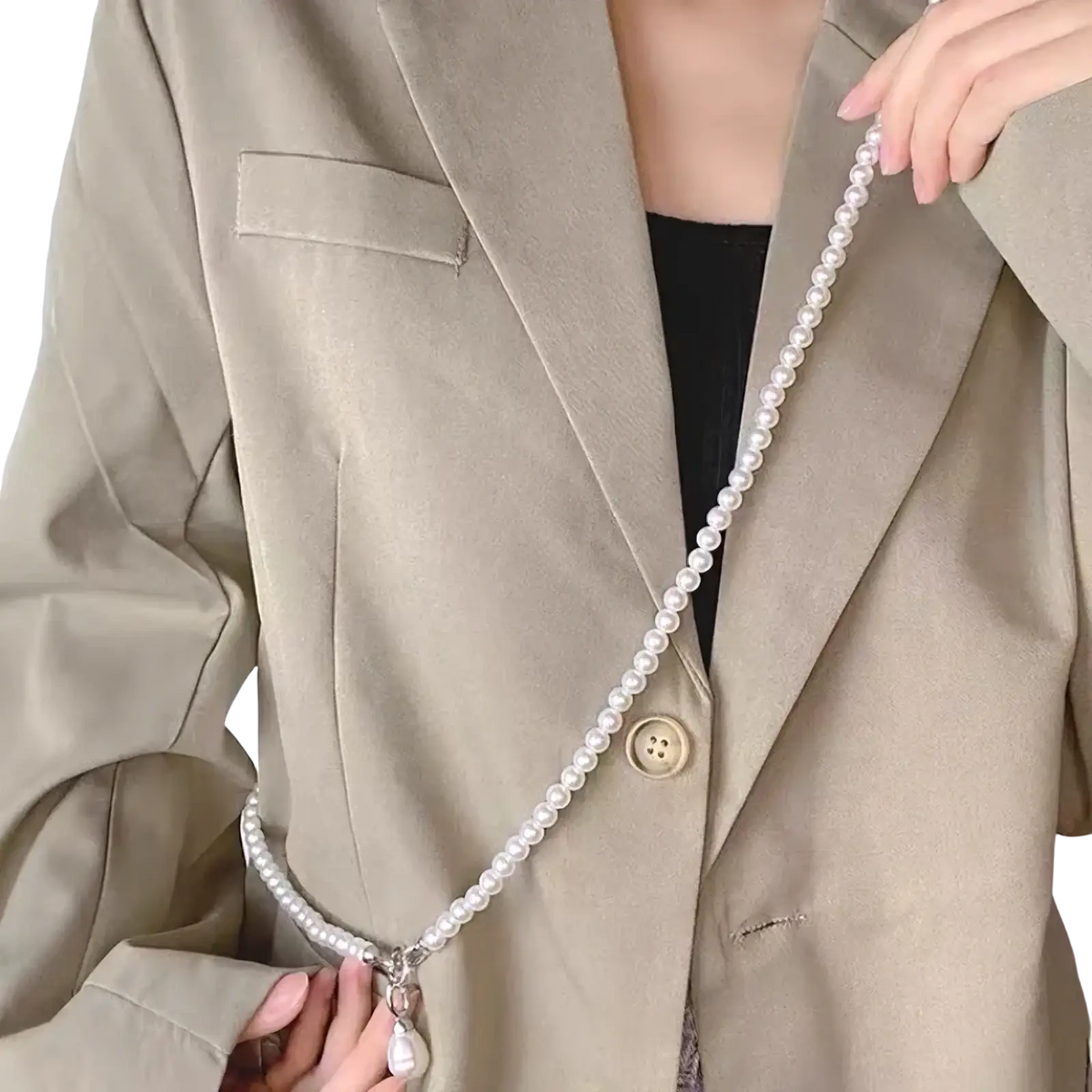 A delicate pearl pendant long necklace for women with a pearl chain strap worn across the body