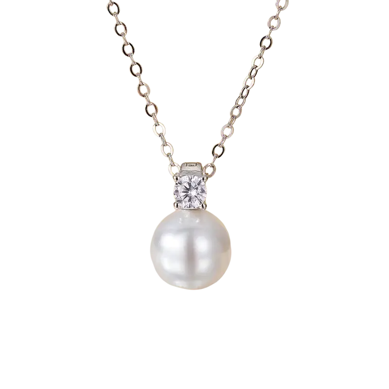 A delicate silver pearl pendant necklace featuring a single white pearl with a sparkling diamond accent