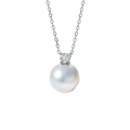 A lustrous white pearl pendant necklace with a single round diamond set in silver-toned metal