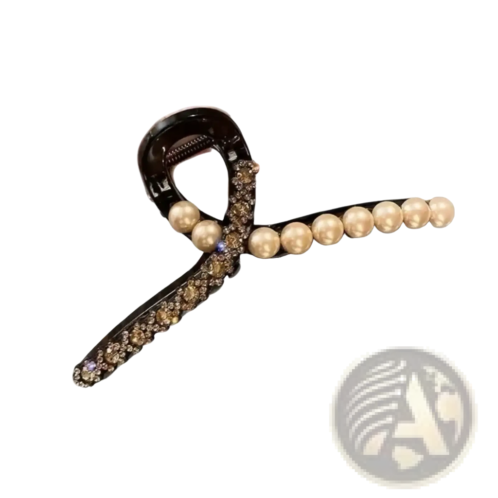 Pearl rhinestone hair claw clip in black with cream pearls and sparkling rhinestones along its curved design