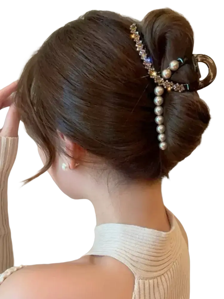 Pearl rhinestone hair claw clip with sparkling crystals and vertical white pearls in an elegant curved design