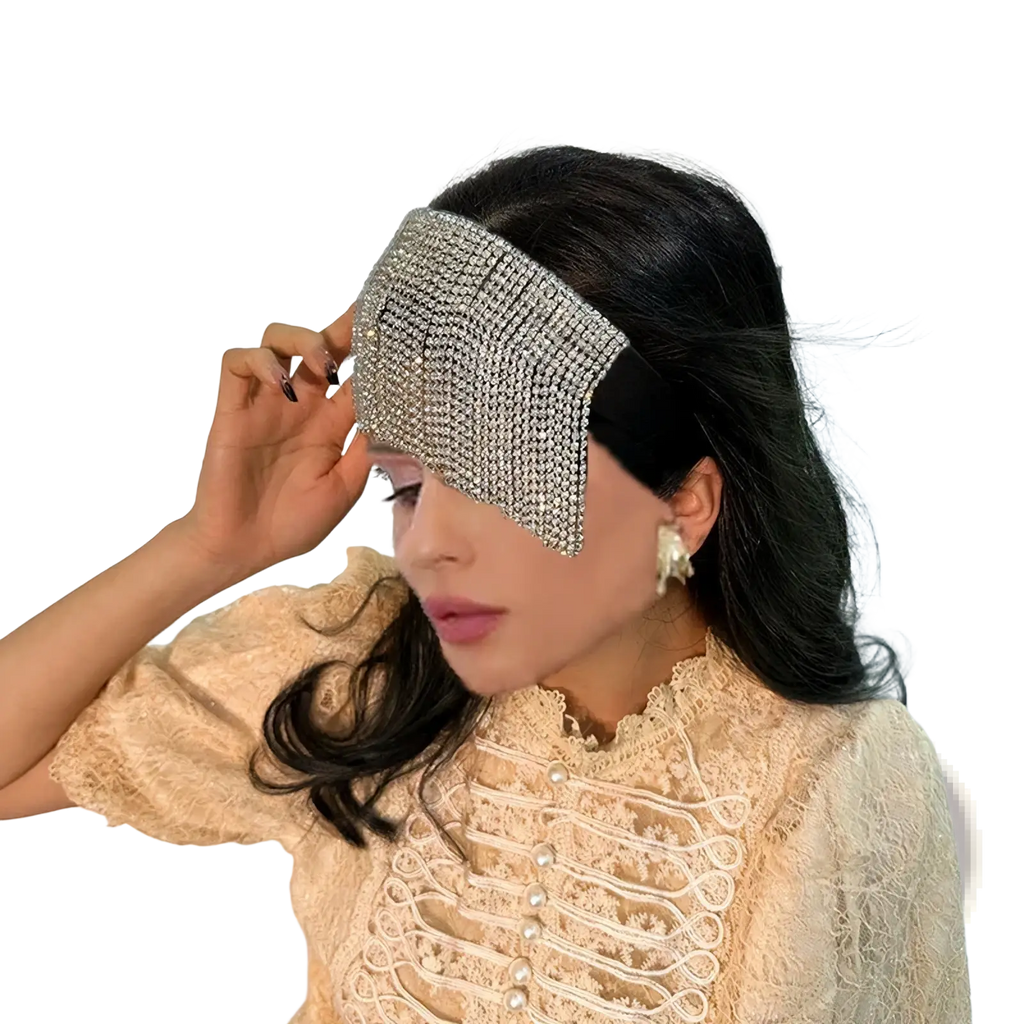 A sparkling silver rhinestone eye mask with a black elastic band from the pearl rhinestone headband elegant bridal hair hoop collection