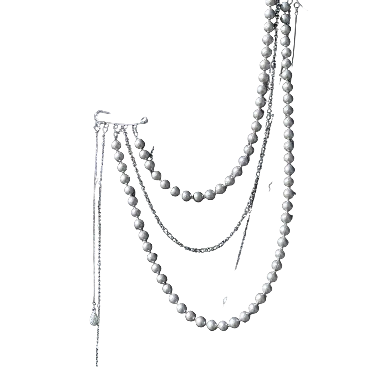 Elegant vintage pearl tassel chain brooch with silver beads and layered pearl strands worn over pinstripe blazer