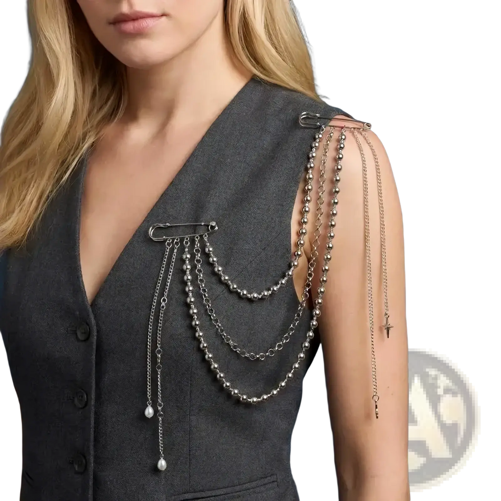 Silver chain shoulder accessory with layered beads and pendants featuring a safety pin clasp for elegant vintage wear