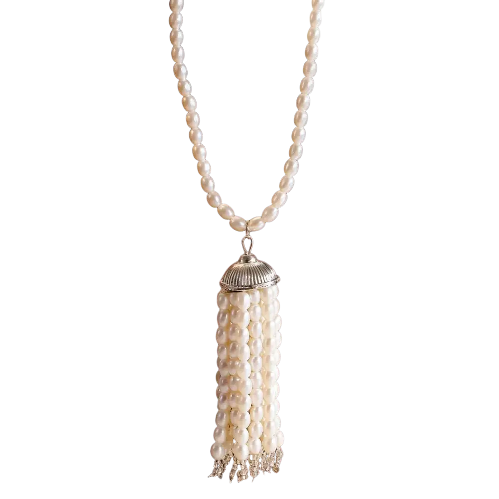 Pearl tassel pendant necklace featuring cream-colored pearls and silver-toned fluted cap with crystal accents