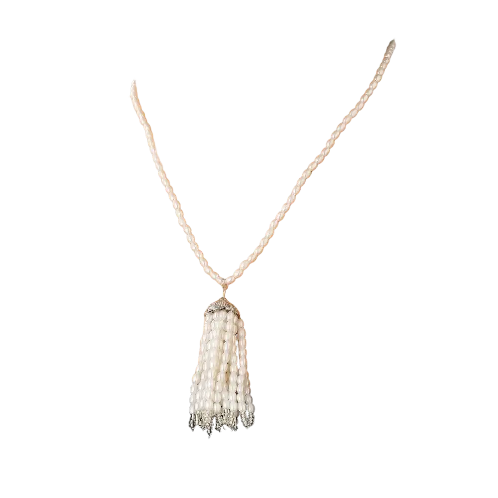 Elegant white pearl tassel pendant necklace with silver-toned metal clasp for long sweater chain styling