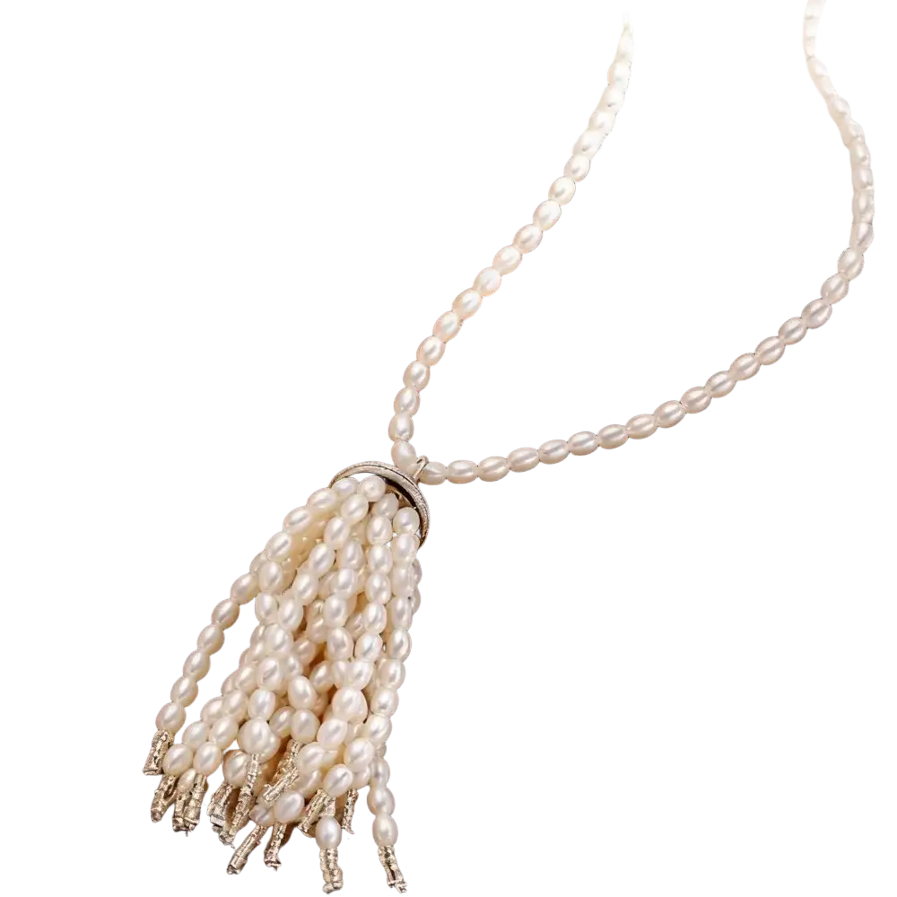 Elegant white pearl tassel pendant necklace with silver-toned clasp and delicate beaded detailing for long sweater chain