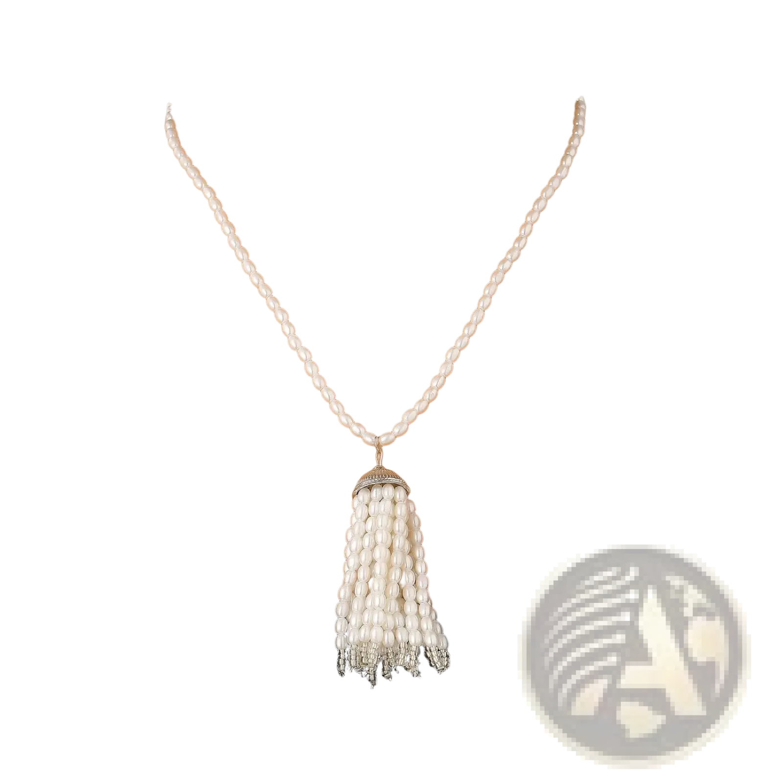 A delicate white pearl tassel pendant necklace with silver-toned accents for long sweater chain styling