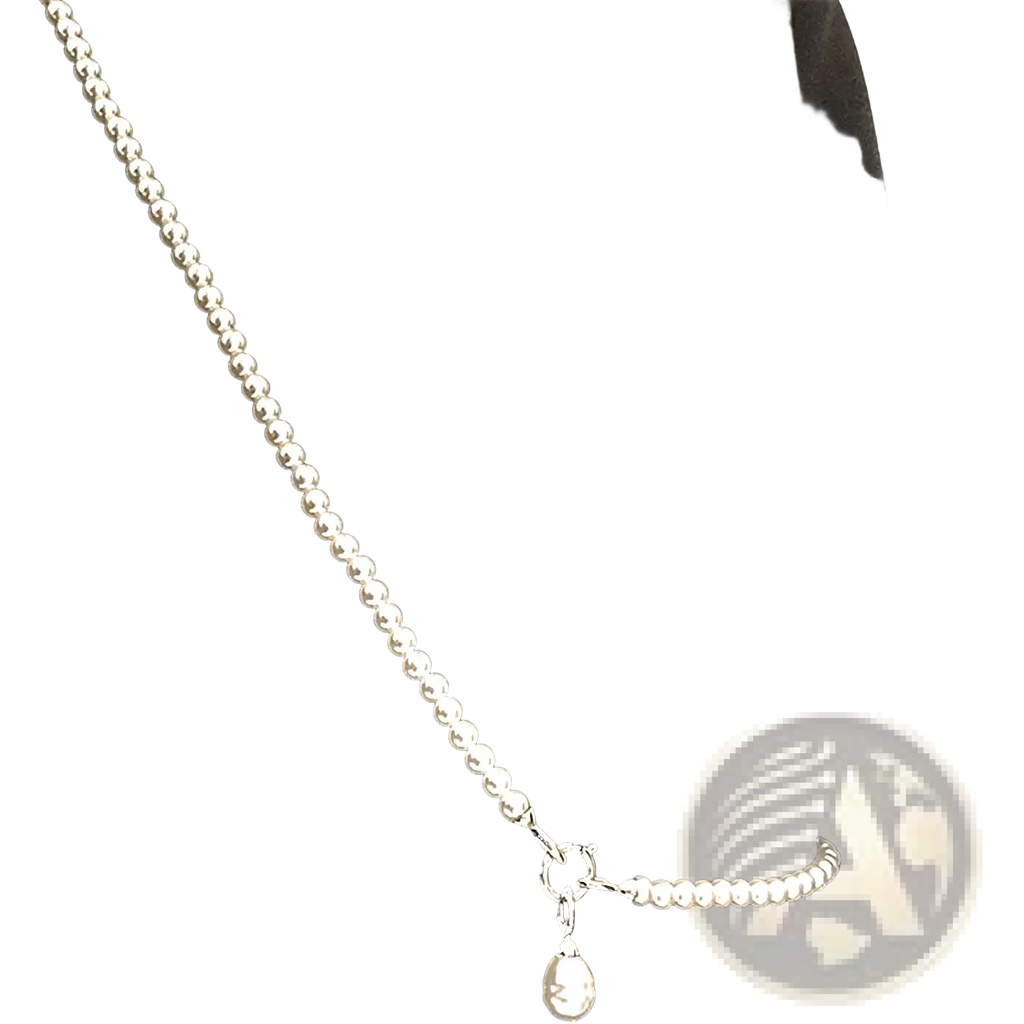 Silver beaded necklace featuring a pearl teardrop pendant and a toggle clasp in silver finish