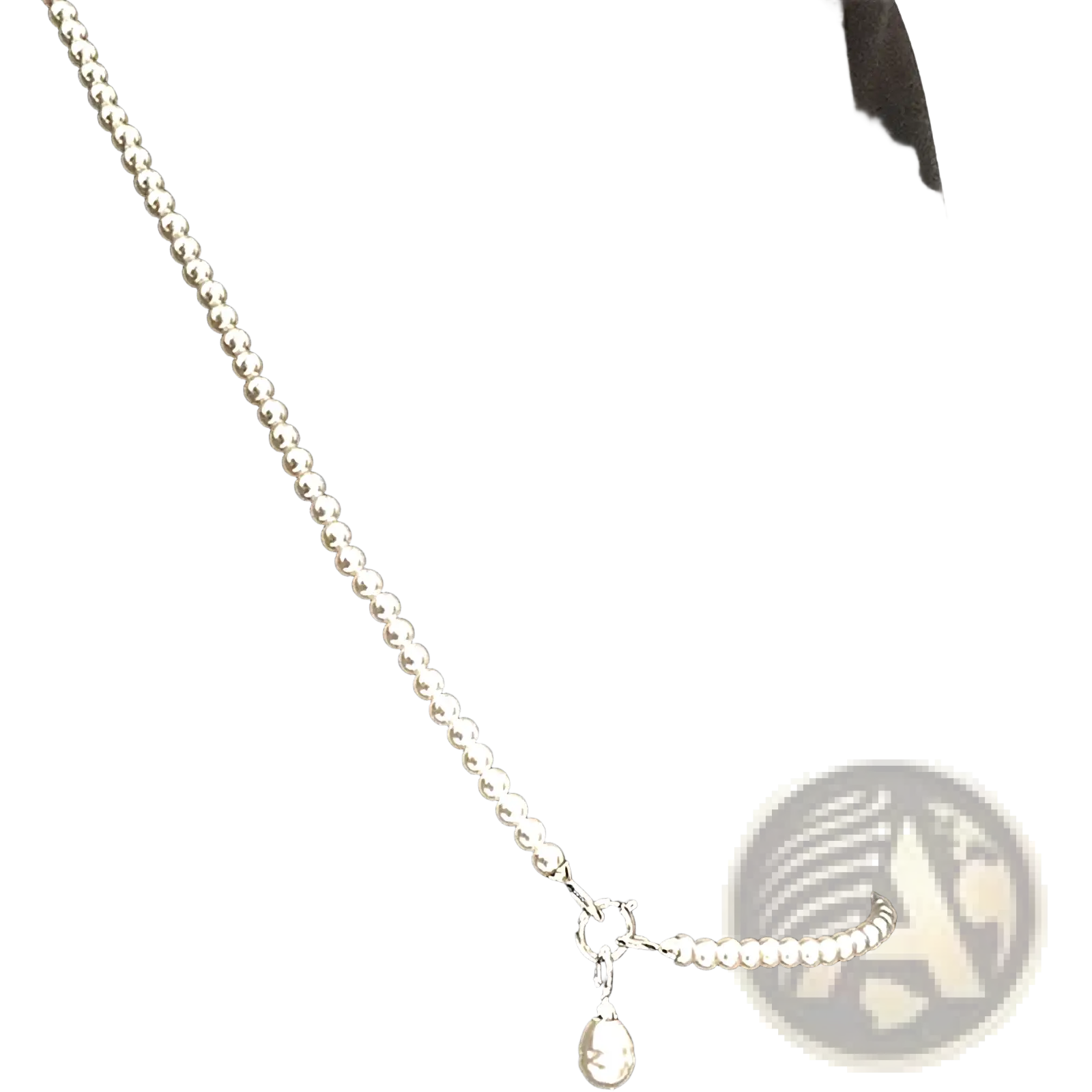 Silver beaded necklace featuring a pearl teardrop pendant and a toggle clasp in silver finish