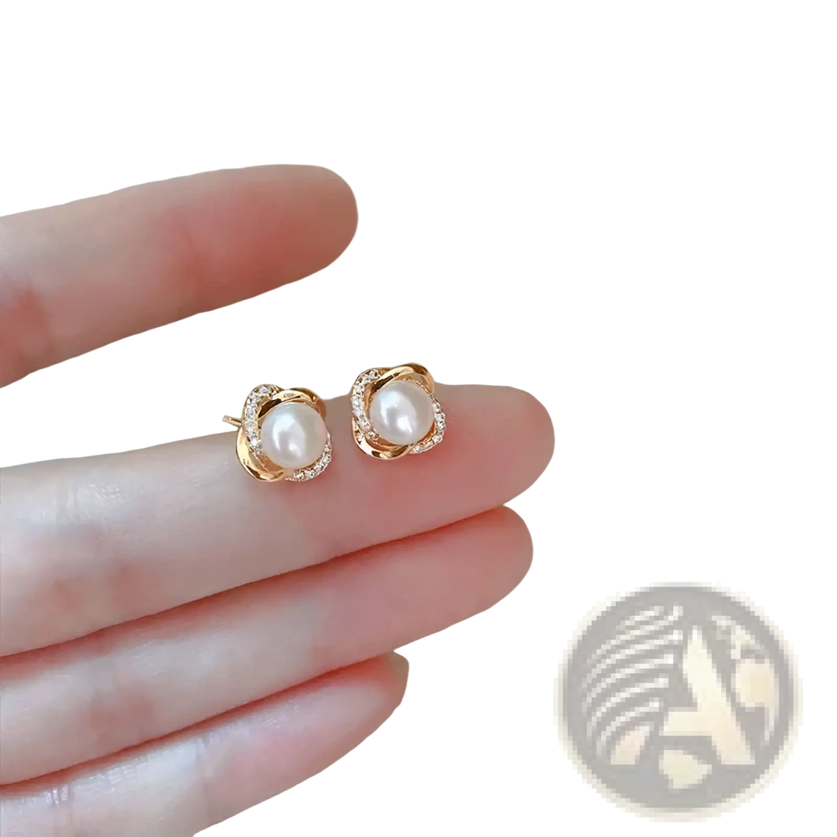 Delicate pearl twist gold stud earrings with a central pearl surrounded by a halo of sparkling crystals